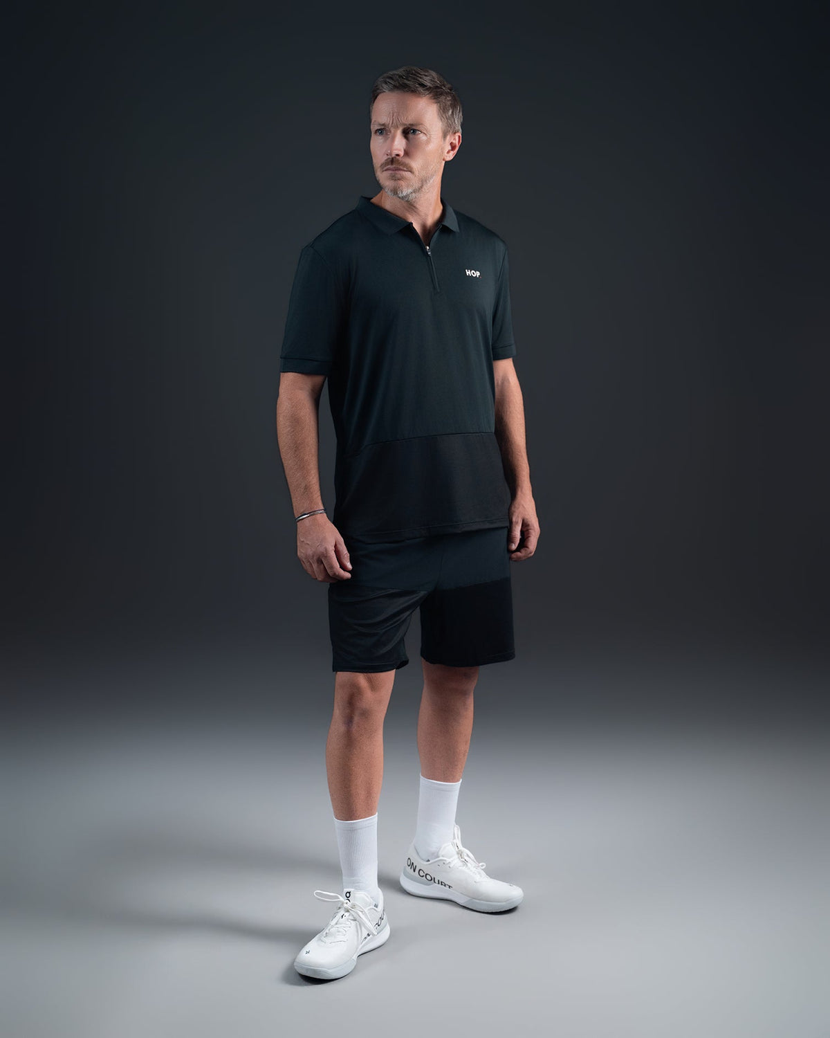 Polo padel Shadow - zippé - antitranspirant - microfibre absorbante HOP.