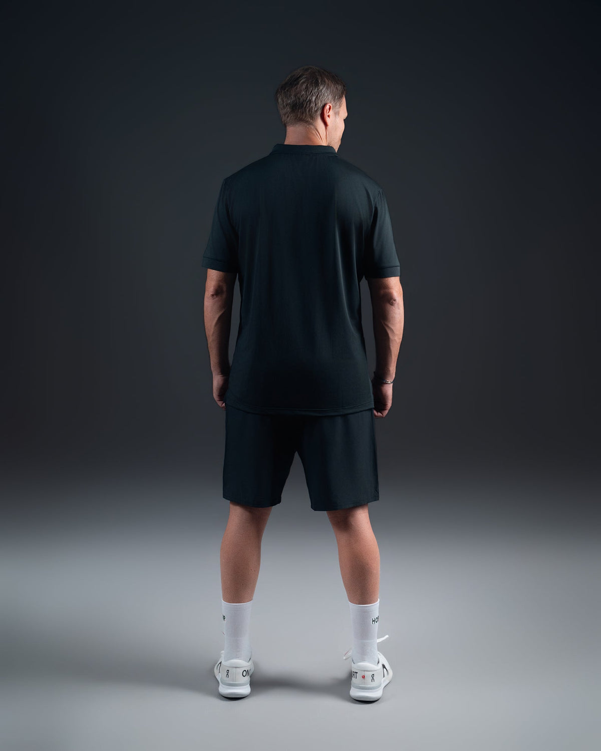 Polo padel Shadow - zippé - antitranspirant - microfibre absorbante HOP.